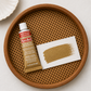 Rub'N Buff product on a wooden tray with a sample swatch