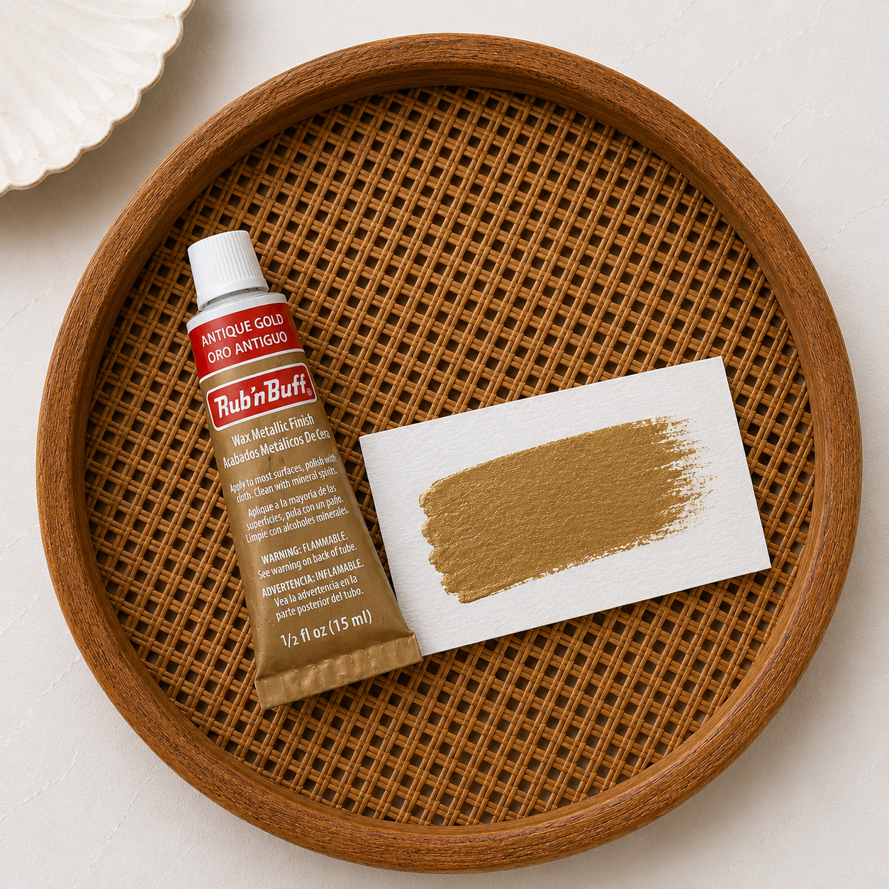 Rub 'Tuff Antiquing Paint tube with sample on a wooden tray